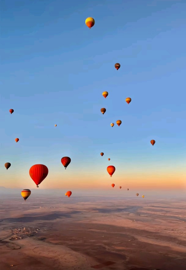 A balloon rising at first light
