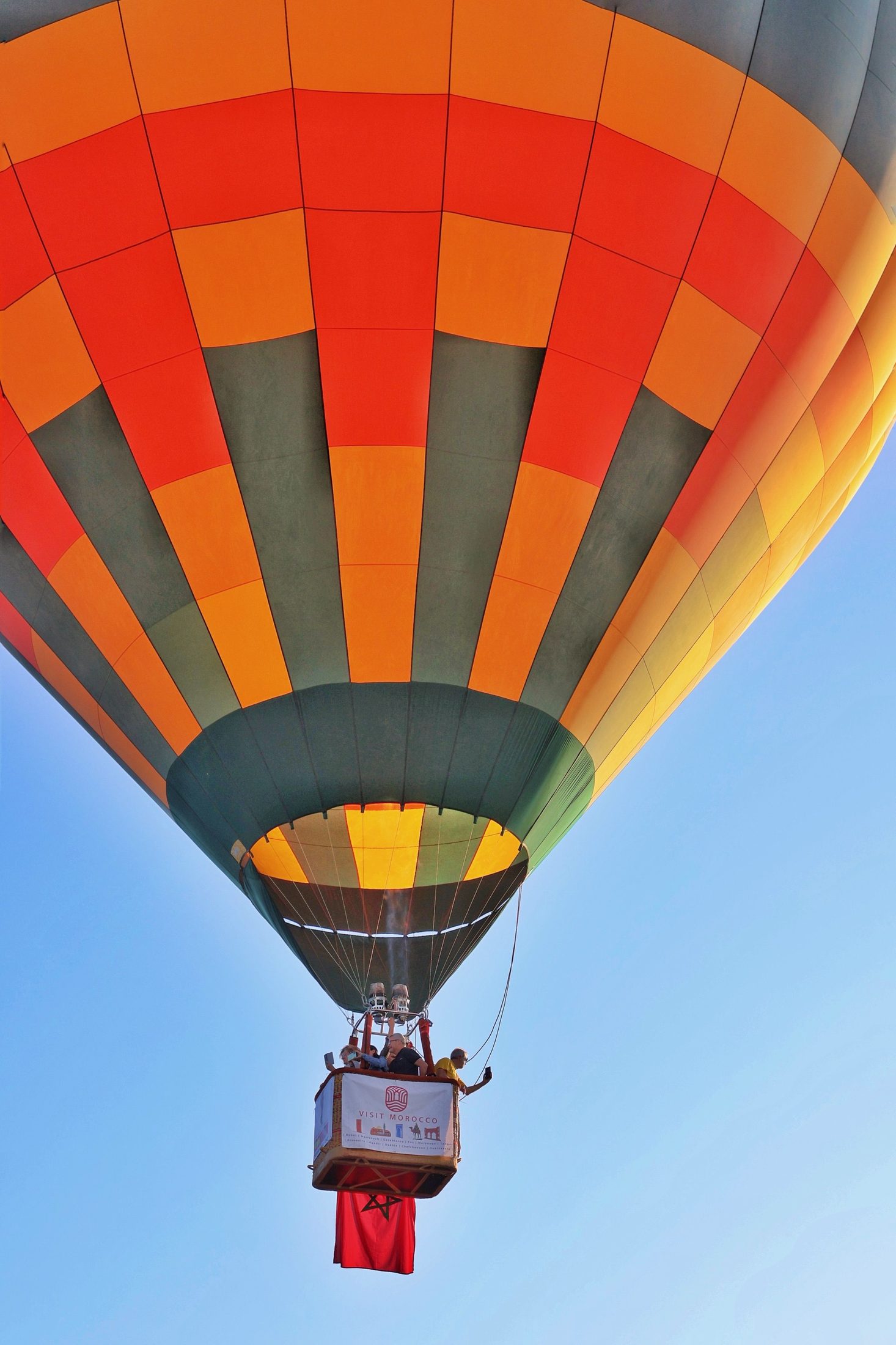 A hot-air balloon inflating at dawn