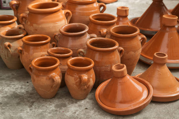 Tagines cooking over coals